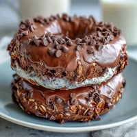 Chewy chocolate chip protein bagels baked golden brown and ready for breakfast, packed with vanilla protein and mini chips.  