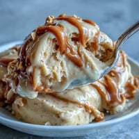 Four-ingredient peanut butter banana ice cream, creamy, dairy-free, and ready in minutes.